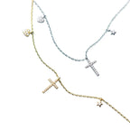 Silver-tone and gold-tone cross necklaces with stone-set hearts and polished star charms