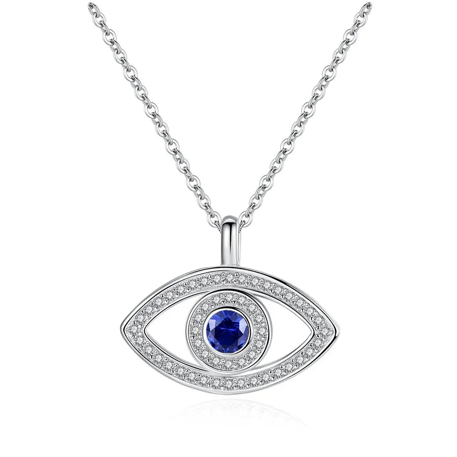 Silver-tone halo evil eye necklace with a round blue stone and two rows of clear CZ stones on white