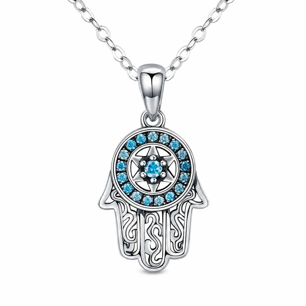 Halo Hamsa Hand Necklace with Blue Stones and Star Center on a plain white background