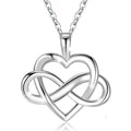Silver open heart and woven infinity pendant suspended from a fine linked chain on white
