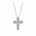 Six-stone 925 sterling silver cross necklace with round moissanite stones on a white background