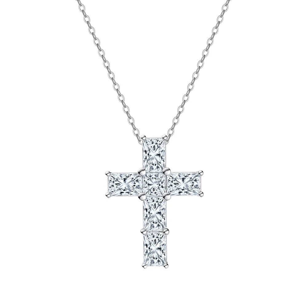 Silver-tone moissanite cross necklace with six clear stones and corner prongs on a white background