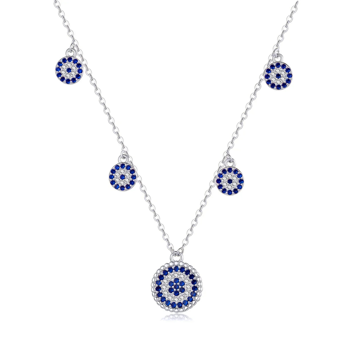 Station evil eye necklace in a silver-tone finish with five blue and clear stone-set eye charms on white