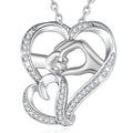 Silver-tone hand in hand heart necklace with clear CZ accents and a silver-colored chain on white