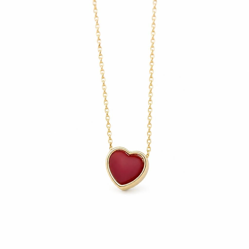 Small Red Heart Necklace with Gold-Colored Rim and Fine Chain on a plain white background