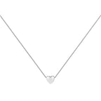Small silver heart necklace with polished raised outline and fine box-link chain on a white background