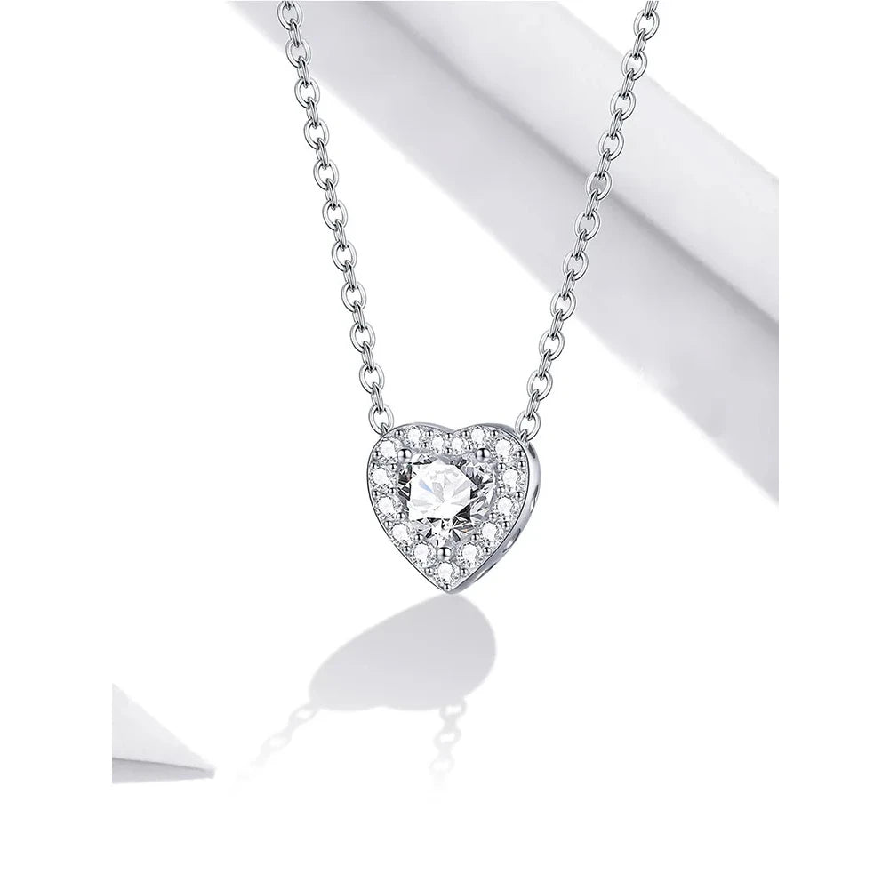 Platinum-plated sterling silver heart necklace with clear CZ stones on a white background