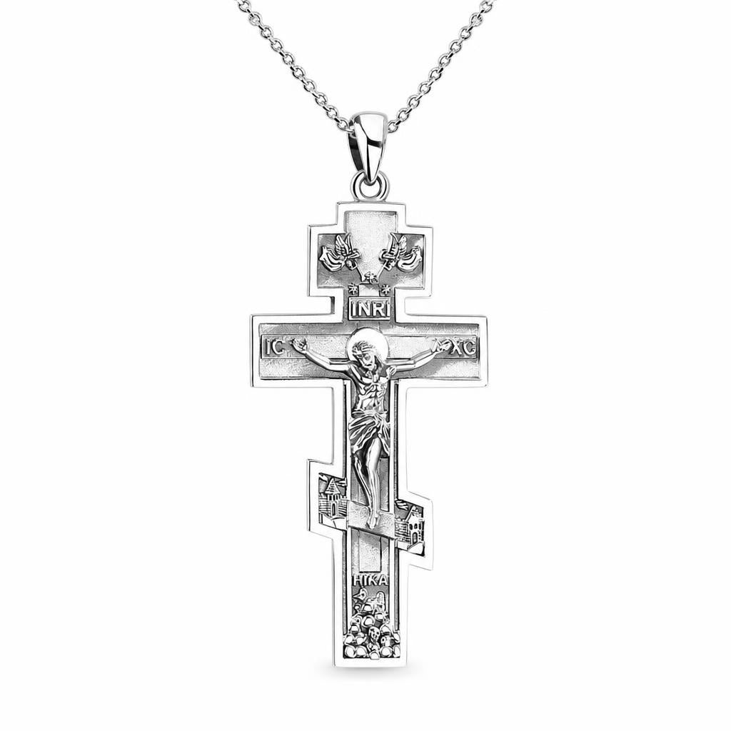 Vintage crucifix necklace in 925 sterling silver with raised Christ figure, angels and INRI detail