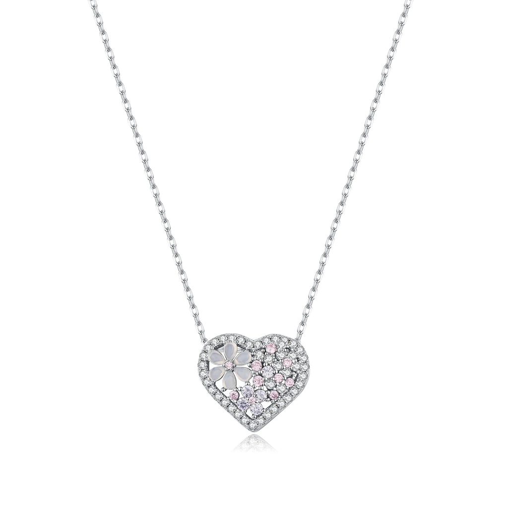 Sterling silver flower heart necklace on a white background with clear and pale pink cubic zirconia stones
