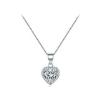 Dainty heart necklace in 925 sterling silver with a clear CZ halo on a white background