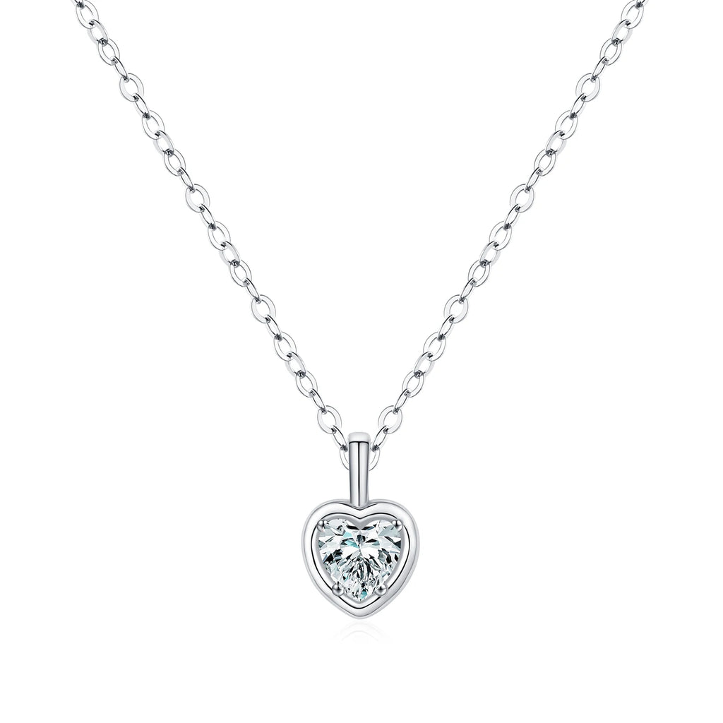 Sterling silver framed heart necklace with a clear cubic zirconia center on white