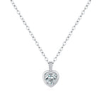 Sterling silver framed heart necklace with a clear cubic zirconia center on white