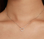 Close view of the 925 sterling silver open heart pendant worn on the neck