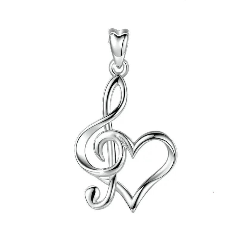 925 sterling silver treble clef and open heart pendant shown without a chain