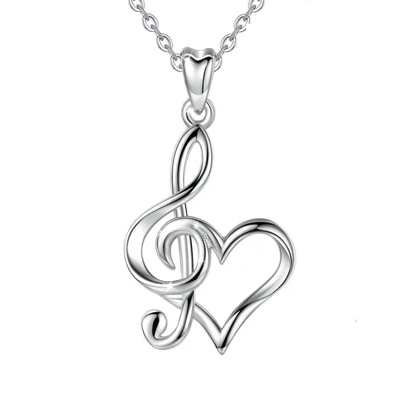 Polished music note heart necklace displayed with a 20 in (51 cm) chain option