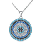 Turkish evil eye necklace in 925 sterling silver with clear CZ and blue, black, and turquoise-colored stone rings on white