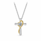 Two-tone silver cross necklace with gold heart ribbon, 925 sterling silver pendant and center moissanite on white
